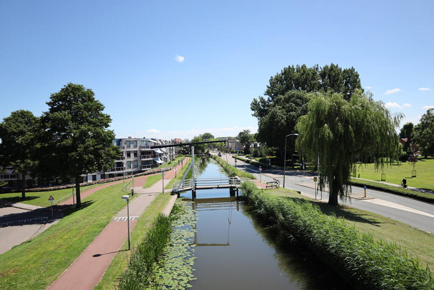 Ring Canal Zuidplaspolder below  the train station of Nieuwerkerk aan den IJssel in the Netherlands - 写真・画像