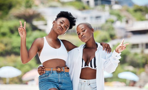 Black women, friends and face portrait peace sign outdoor on a trip, vacation or summer holiday. Happy African girls, photograph on a nature adventure or hangout gathering with a smile together - 写真・画像