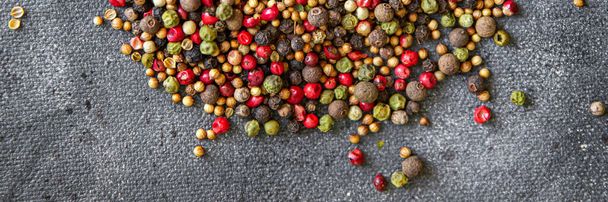 pepper peppercorn 5 spices red, black, green and white pepper, coriander food spice on the table copy space food background  - 写真・画像