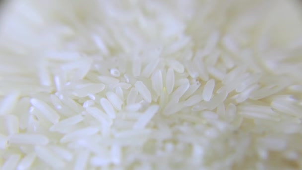 Selektivní zaměření, super makro, pohled shora, textura, bílá rýže basmati - Záběry, video
