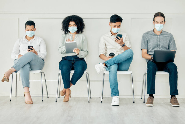 Business people with covid face mask and technology in line, communication on tablet, phone and laptop before interview and connection to global world. Employees with tech in recruitment at work. - Foto, immagini