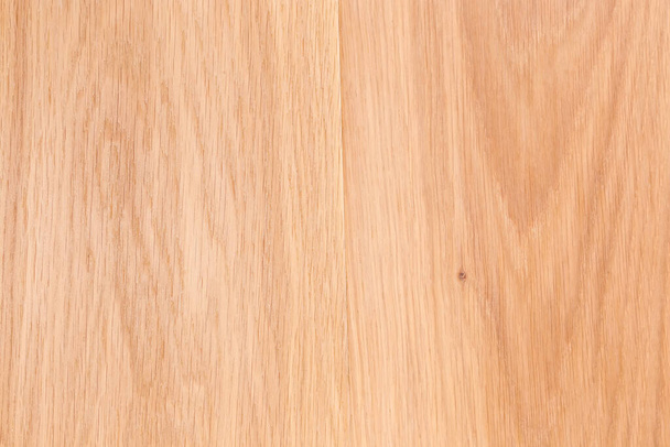 Texture of the wooden surface on the longitudinal cut of the light colored oak planks, top view close-up, background - Φωτογραφία, εικόνα