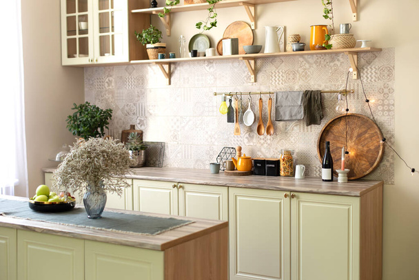 https://cdn.create.vista.com/api/media/small/606355552/stock-photo-green-wooden-kitchen-interior-wooden-shelf-cozy-decoration-stylish-cuisine