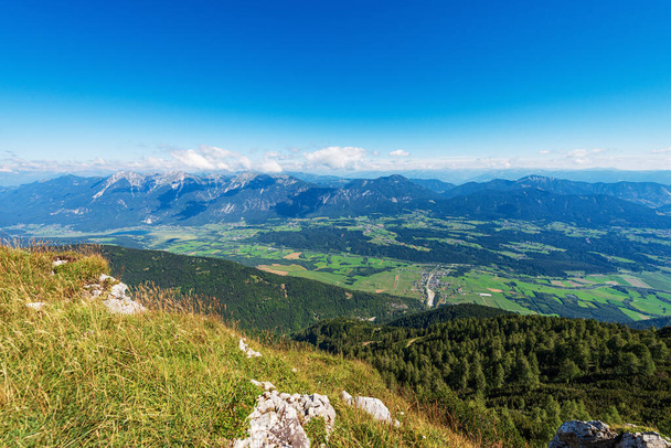 Panorama of Austria from the Mountain Peak of the Osternig or Oisternig, Carnic Alps and Gailtal Alps, Feistritz an der Gail municipality, Austria, Carinthia, central Europe. Italy-Austria Border. - Foto, afbeelding