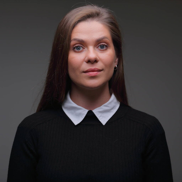 Strict teacher woman in black suit with white collar close up face, isolated female portrait. - Фото, зображення