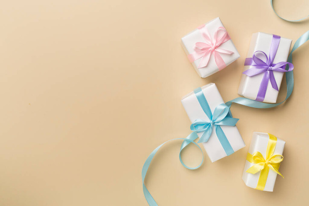 Colorful gift boxes on color background, top view. - Photo, Image