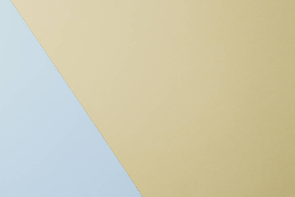 Light blue and yellow pastel paper texture. Two color paper background. - Φωτογραφία, εικόνα