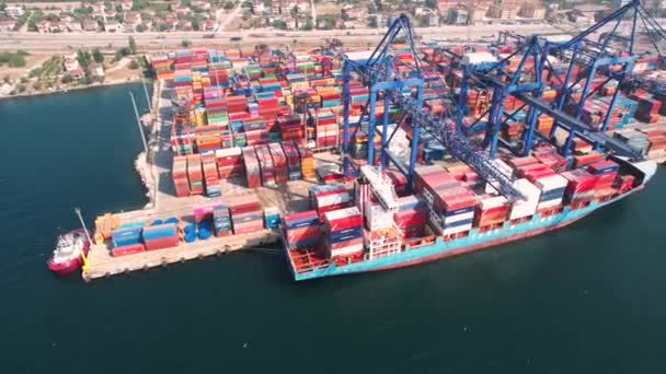 container port and ship, aerial container port and cargo ship - Metraje, vídeo