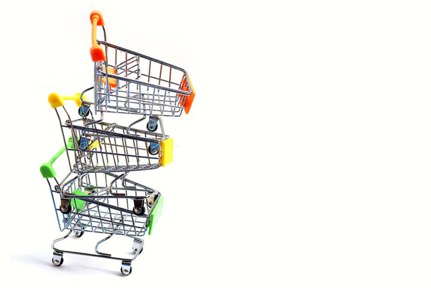 Shopping trolley or Shopping cart on white background. - Valokuva, kuva