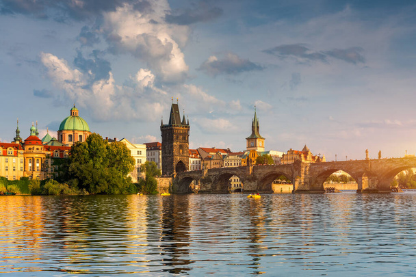 Charles Bridge sunset view of the Old Town pier architecture, Charles Bridge over Vltava river in Prague, Czechia. Old Town of Prague with Charles Bridge, Prague, Czech Republic. - Photo, image