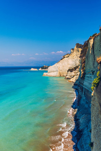 Beautiful view of Cape Drastis in the island of Corfu in Greece. Cape Drastis, the impressive formations of the ground, rocks and the blue waters panorama, Cape Drastis, Corfu, Greece, Ionian Islands. - Photo, image