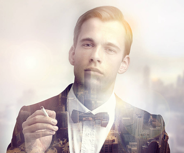 Im lord of this concrete jungle. Multiple exposure shot of a businessman and a cityscape - Foto, Imagen