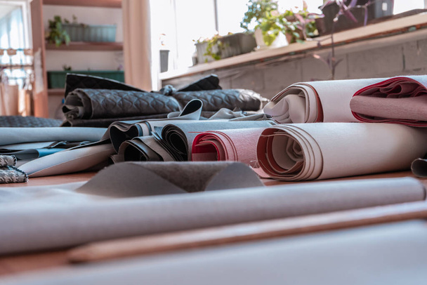 Fabric of different types in a sewing workshop - Fotografie, Obrázek
