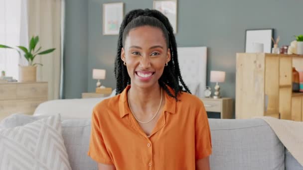 Happy black woman, portrait in home apartment and silly face relaxing in living room. Comedy humor show on couch, goofy laugh at funny meme joke and smile of young african girl with happiness. - Footage, Video