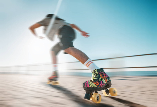 Freedom, speed and fitness, a woman on roller skates in the sun. Summer sports, retro exercise and a girl skating as a workout. Action, motion and sunshine, a professional skater going fast on a path. - Foto, Bild
