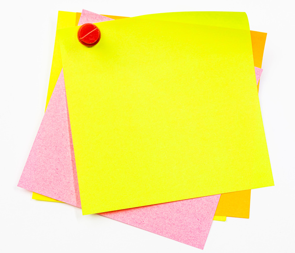Sticky colored papers on a white background in the office. - Photo, image