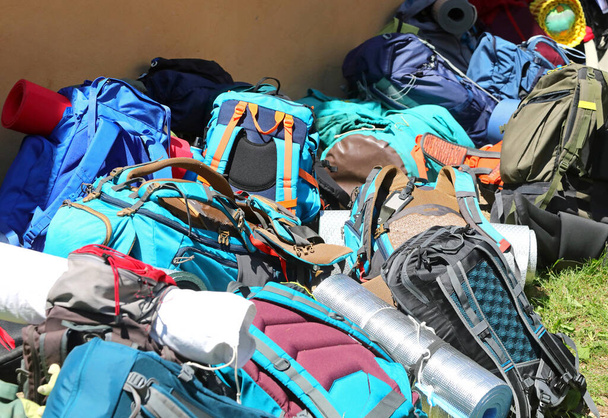 many backpacks and backpacks with sleeping bags during the boyscout summer camp without people - Φωτογραφία, εικόνα