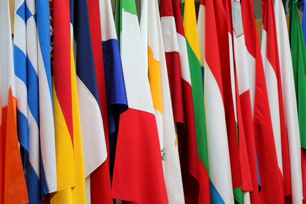 background with many international flags of many nations and different colors - Fotoğraf, Görsel