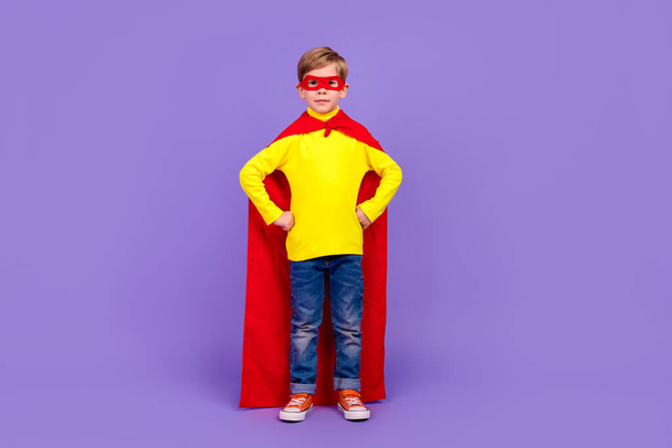 Full length photo of funny confident little grandson dressed red cape hands arms waist isolated purple color background. - Fotoğraf, Görsel