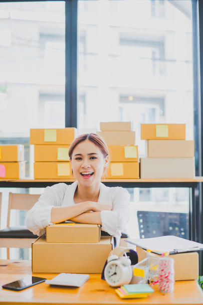 Small business owners online smiling happily at work. where customers place orders and check the orders that the customers have ordered of online retailers - online shopping - 写真・画像