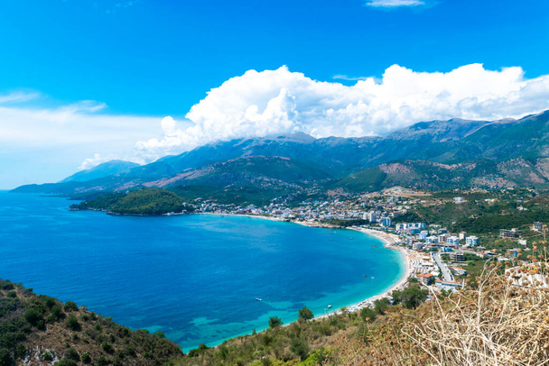 Panoramic view from the top on the resort Himare town. Beautiful summer cloud mountain landscape. Ionian sea. Albania. - Zdjęcie, obraz