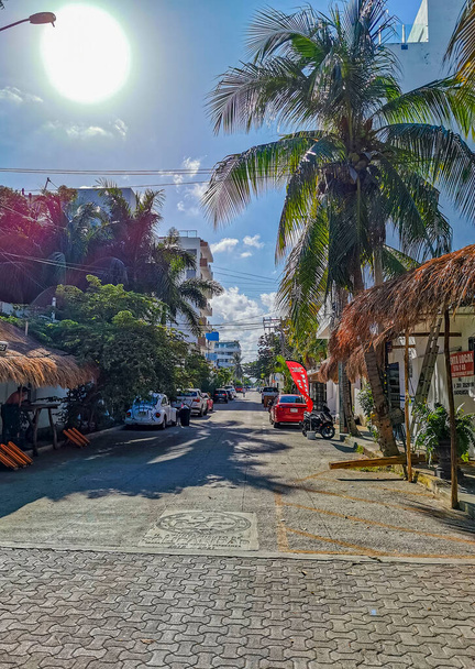 Playa del Carmen Mexico 04. July 2022 Typical street road and cityscape with cars and buildings of Luis Donaldo Colosio Playa del Carmen in Mexico. - Fotografie, Obrázek