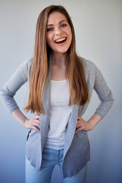 Happy girl with long hair wearing casual clothes. isolated portrait. - Фото, зображення