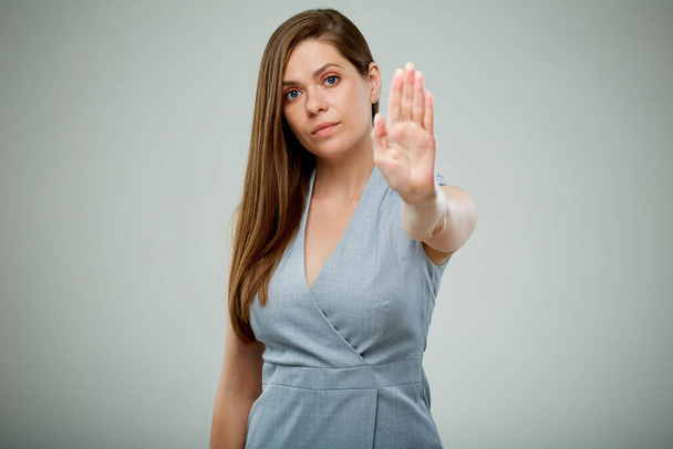 Business woman gesturing stop with hands. isolated female portrait. - Fotó, kép