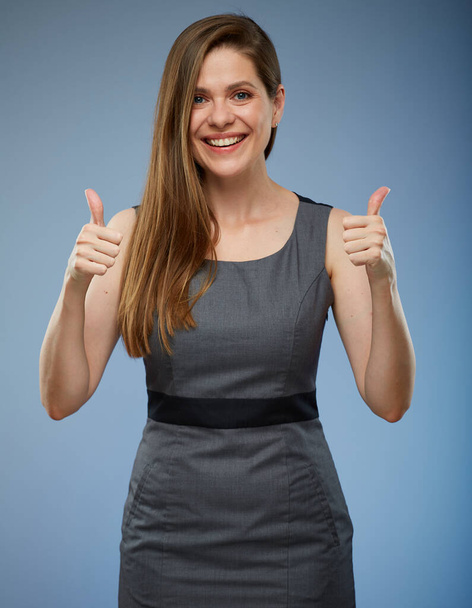 Smiling business woman in dress show thumbs up. loke symbol. isolated female portrait. - Photo, image