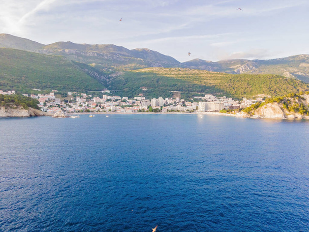 Aerial view of the small town Petrovac, Montenegro and Lucice beach. - Фото, изображение