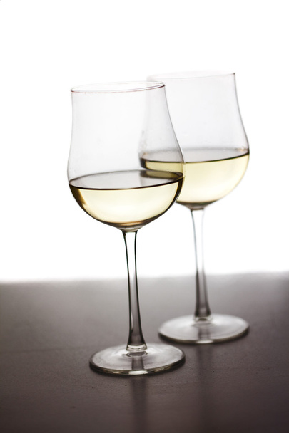 Glass of wine on a white background - Foto, afbeelding