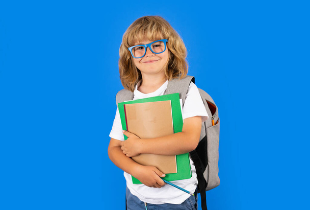 Learning knowledge and kids education concept. School teen boy in with backpack - Фото, зображення
