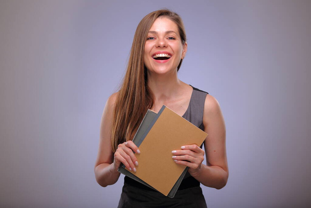 Woman teacher or adult student with book or workbook, open mouth, happy business person, Isolated female portrait . - Foto, Bild