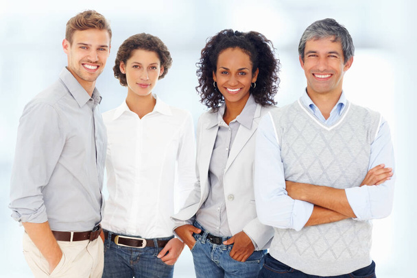 Successful business people. Portrait of four business partners standing together - Foto, imagen