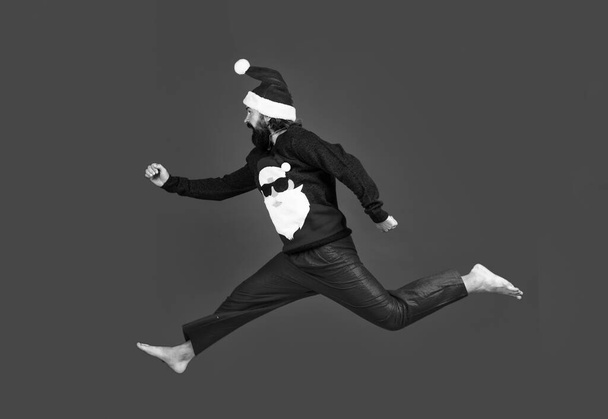 Christmas time. feel free. happy new 2021 year. merry christmas. xmas party fun. happy bearded man hipster wear red festive elf costume. mature santa claus jumping. funny winter holiday celebration. - Fotoğraf, Görsel