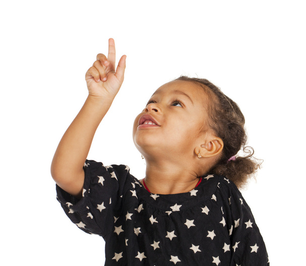 African little girl pointing her finger up - 写真・画像