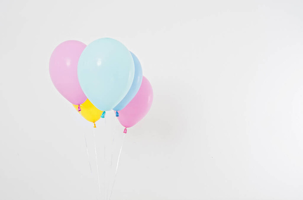 Colorful party balloons background. Isolated on white. Copy space - Photo, Image