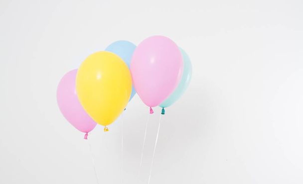 Colorful party balloons background. Isolated on white. Copy space - Fotó, kép