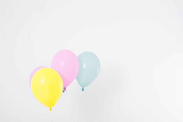 Colorful party balloons background. Isolated on white. Copy space - Fotó, kép