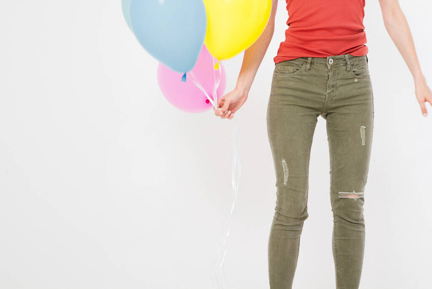 young woman girl with colored balloons isolated on white background. Copy space - Photo, Image