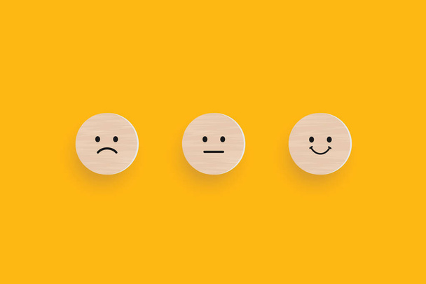 Wooden blocks with the happy face smile face symbol on yellow background, evaluation, Increase rating, Customer experience, satisfaction and best excellent services rating concept. Vector illustrator - Vektör, Görsel