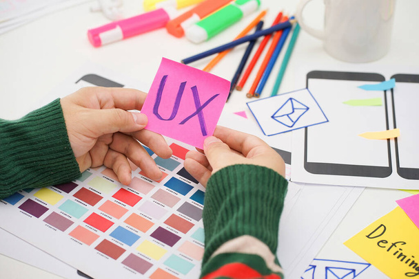 Creative top view photo of UX UI designer working space. User experience concept - Foto, Imagem