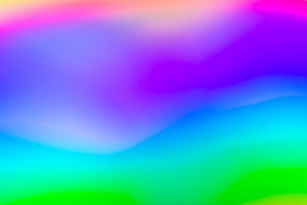 Abstrait flou holographique feuille d'arc-en-ciel fond irisé - Photo, image
