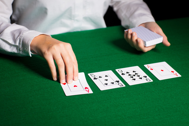 holdem dealer with playing cards - Zdjęcie, obraz