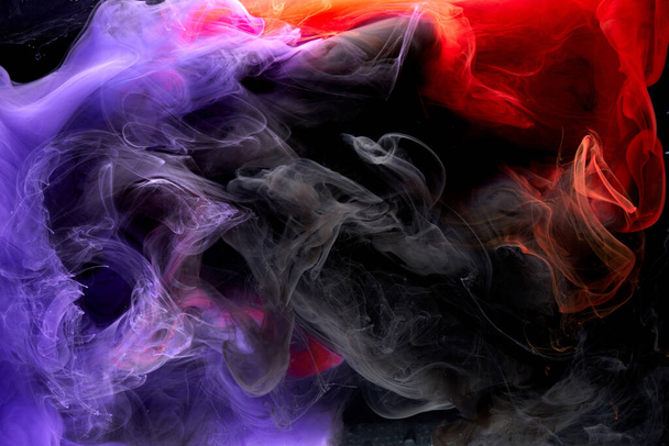 Blue red colorful smoke abstract background, acrylic paint underwater explosion - Fotó, kép
