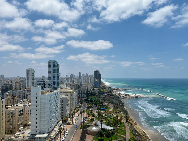 View of the waterfront coastline with hotels in Netanya in Israel. Mediterranean Sea. - Zdjęcie, obraz