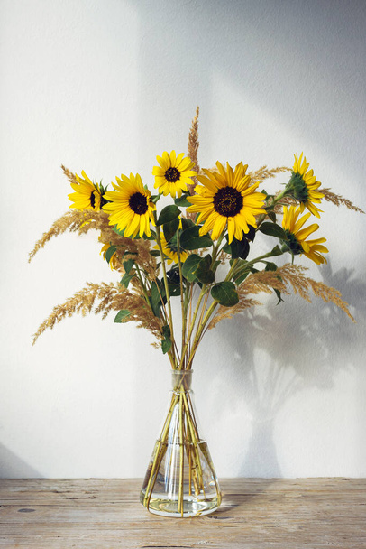 Autumn bouquet with sunflowers and pampas grass. Still life. - Photo, image