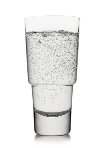 Luxury Glass of natural mineral sparkling water on white. - Photo, image