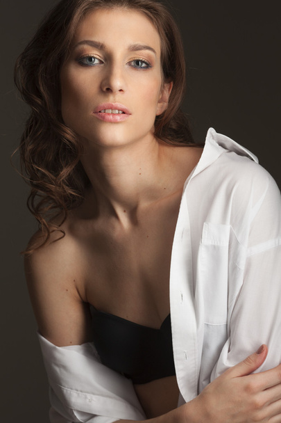 Studio portrait of a sexy young brunette woman - Fotografie, Obrázek