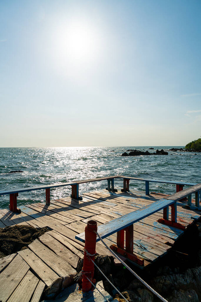 balcony and wooden bench with coast and sea background at Chedi Klang Nam in Chanthaburi, Thailand - Foto, Imagem